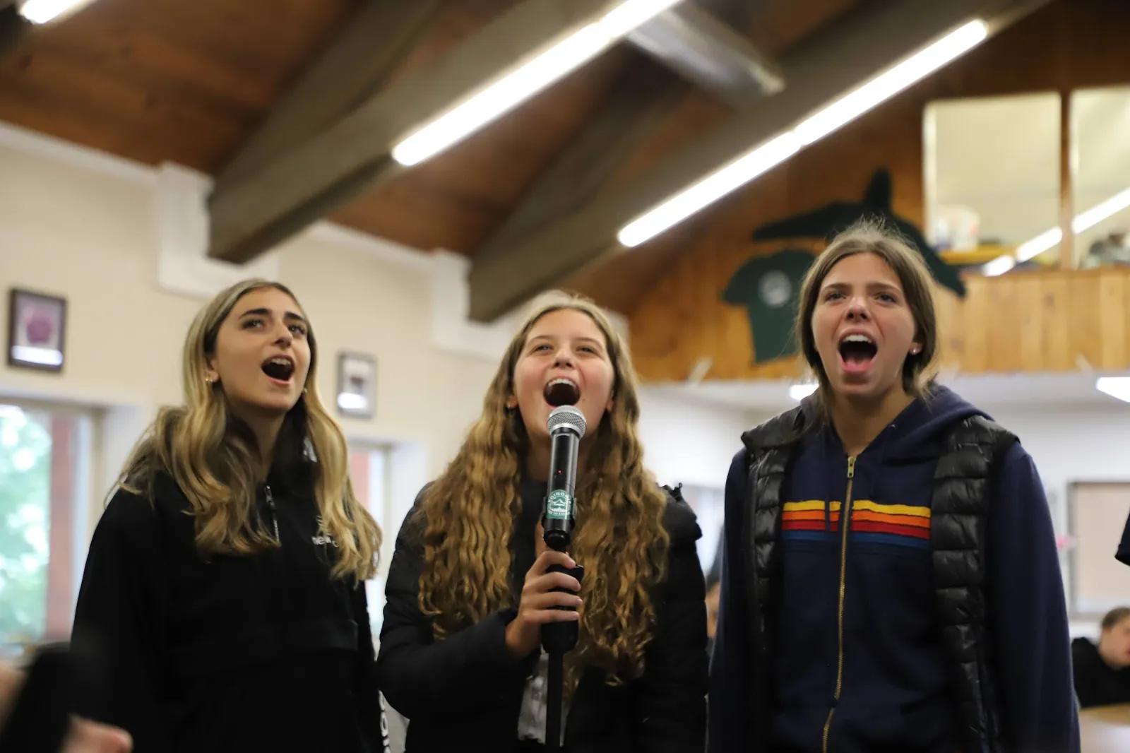 Campers singing together during a camp program